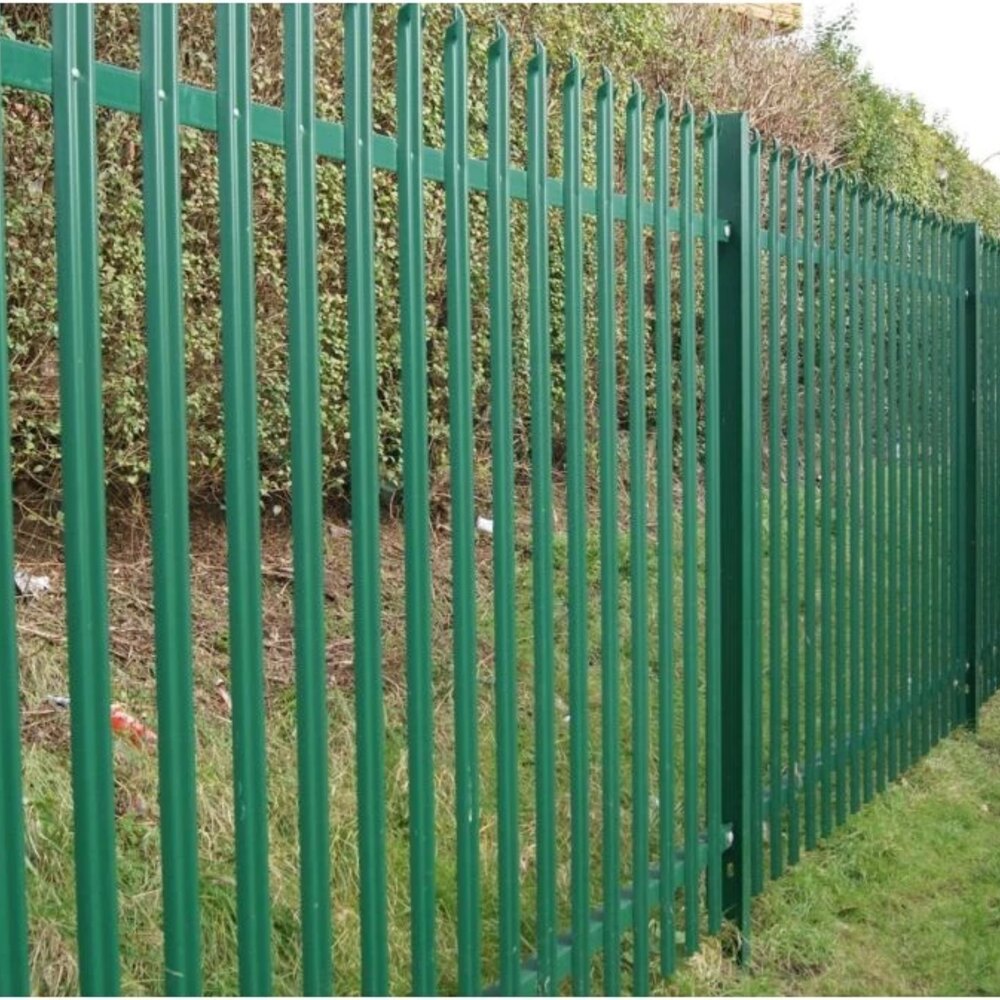 Green steel palisade fencing installed along a boundary